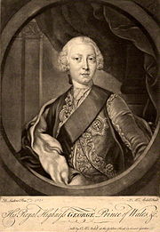 Half-length monochrome portrait of a young clean-shaven man wearing a sash, a finely-embroidered jacket, the star of the  Order of the Garter, and a powdered wig.