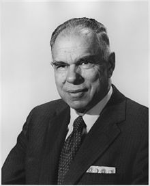 Picture of an elderly man in a suit facing the left to the viewer.