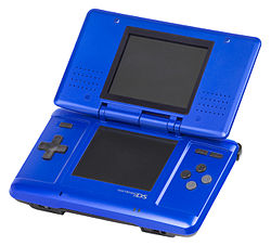 An open, electric blue original Nintendo DS system.