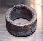 A rusty metal cylinder